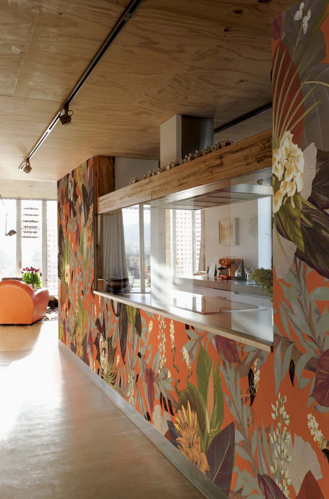 The Rowan designer wallcover creating warmth and character in a modern kitchen interior.