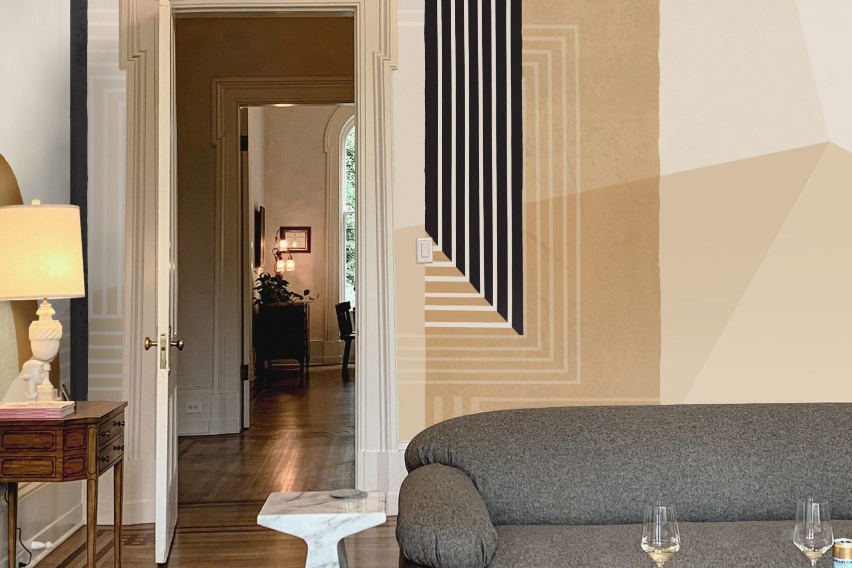 Continuous wallcovering composition designed in relation to the architecture of an interior.